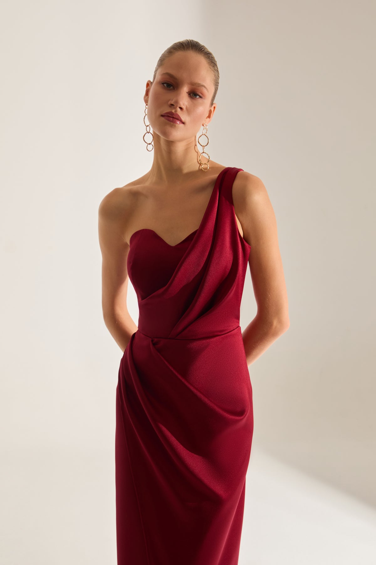 DARK RED EVENING DRESS WITH OLA TEK SLEEVE AND FLAG